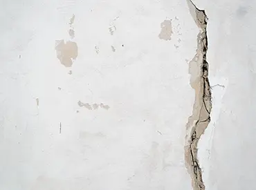 Expert Fissures et déformations de batiment